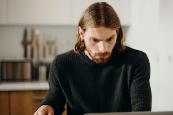 Man looking energetic and focused while working out